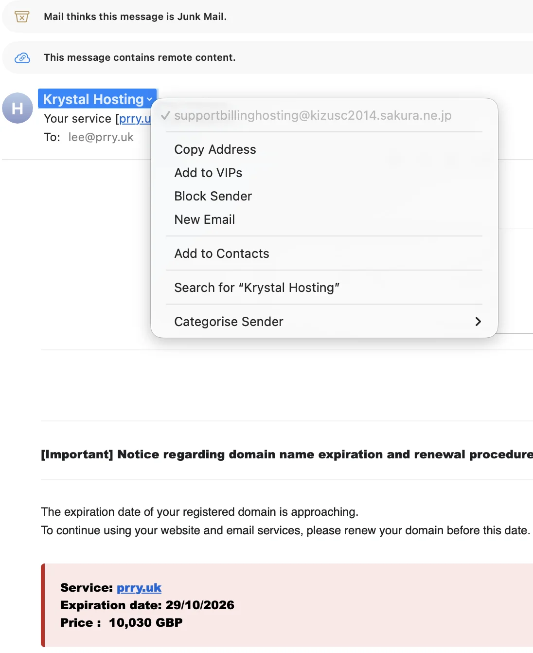iCloud inbox showing a domain expiration notice from Krystal Hosting for prry.uk expiring 29/10/2026 at 10,030 GBP, marked as junk mail with remote content warning.
